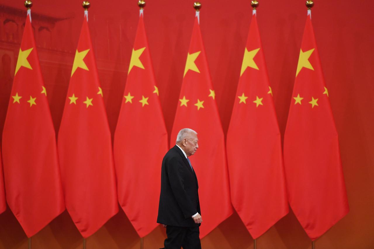 Former Hong Kong chief executive Tung Chee-hwa walks out to receive an award from Chinese President Xi Jinping at a ceremony in Beijing's Great Hall of the People on September 29, 2019. (AFP Photo)