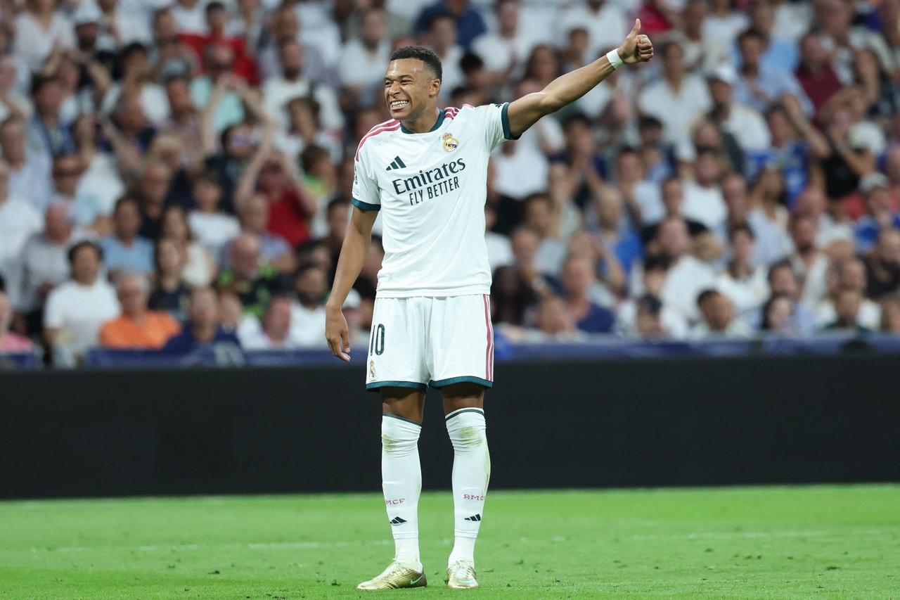 Real Madrid's French forward #10 Kylian Mbappe reacts during the UEFA Champions League first round day 1 football match between Real Madrid and Inter Milan at the Santiago Bernabeu stadium in Madrid on September 8, 2026. (AFP Photo)